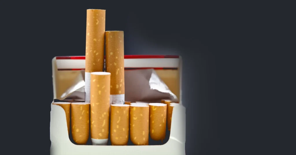 Open cigarette pack with cigarettes visible.